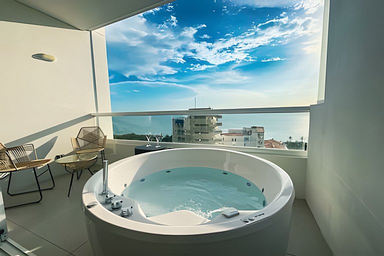 Escápate  jacuzzi y vista al mar