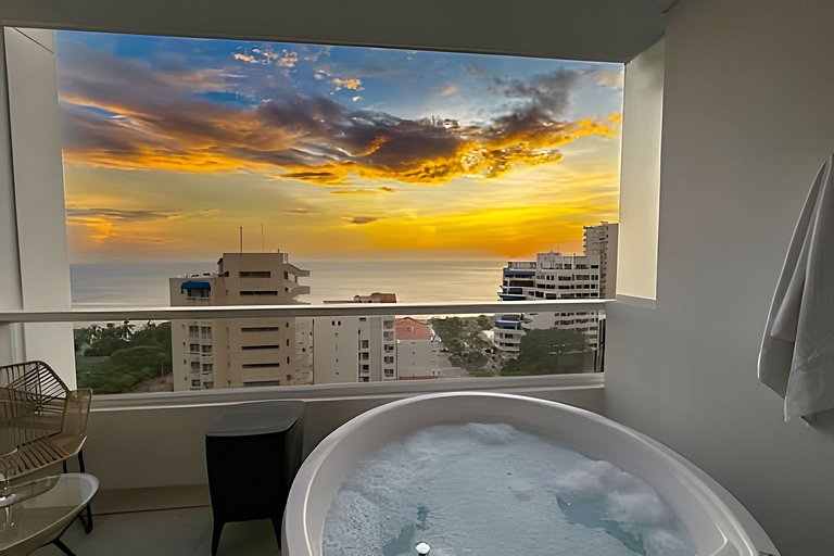 Escápate  jacuzzi y vista al mar