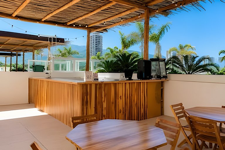 Balcón al mar y piscinas en Bello Horizonte